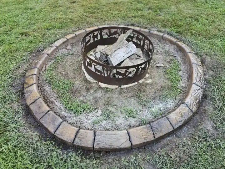 Custom concrete stepping stone path with decorative curbing