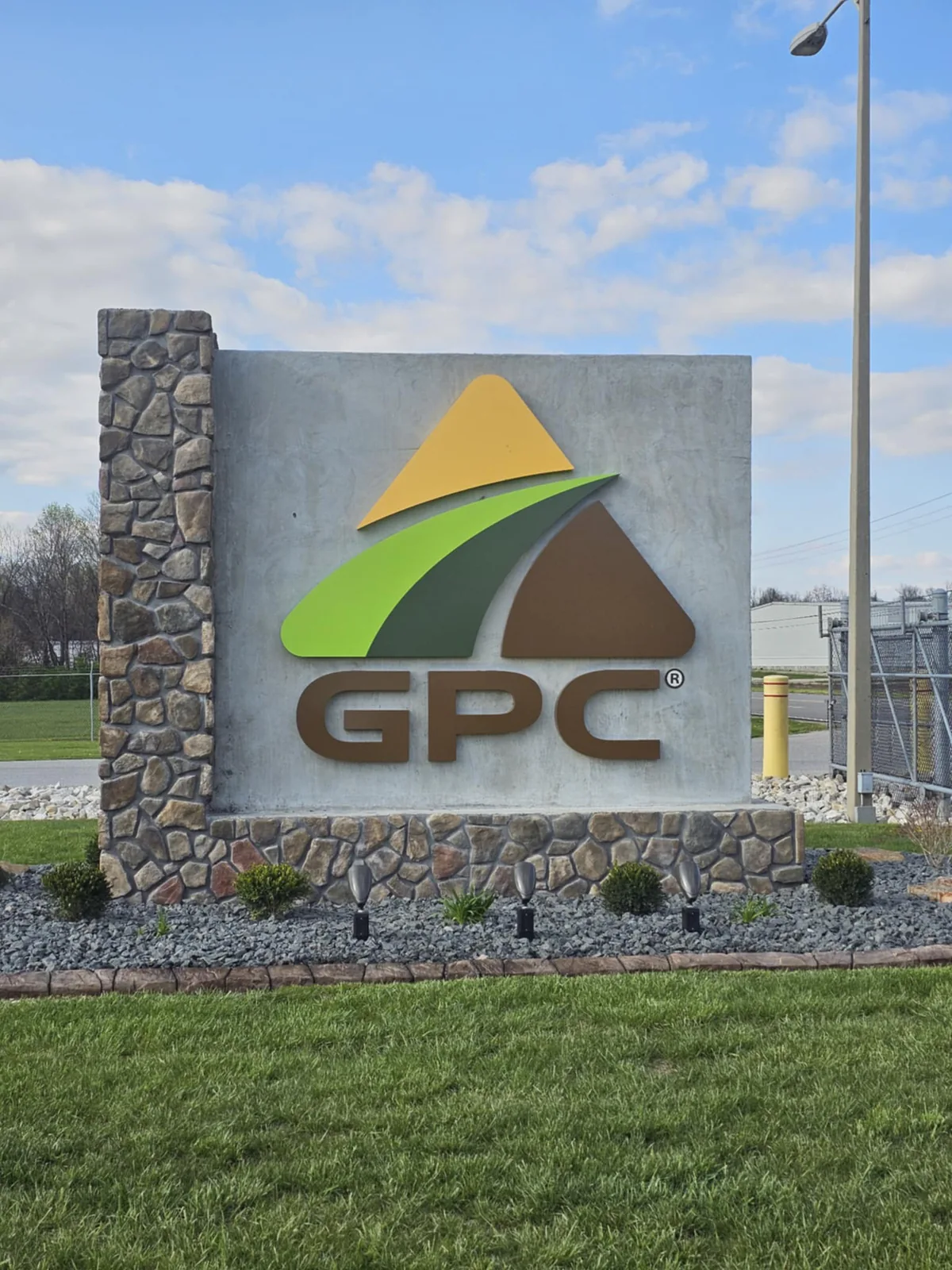 Decorative commercial concrete curbing around the GPC monument landscape
