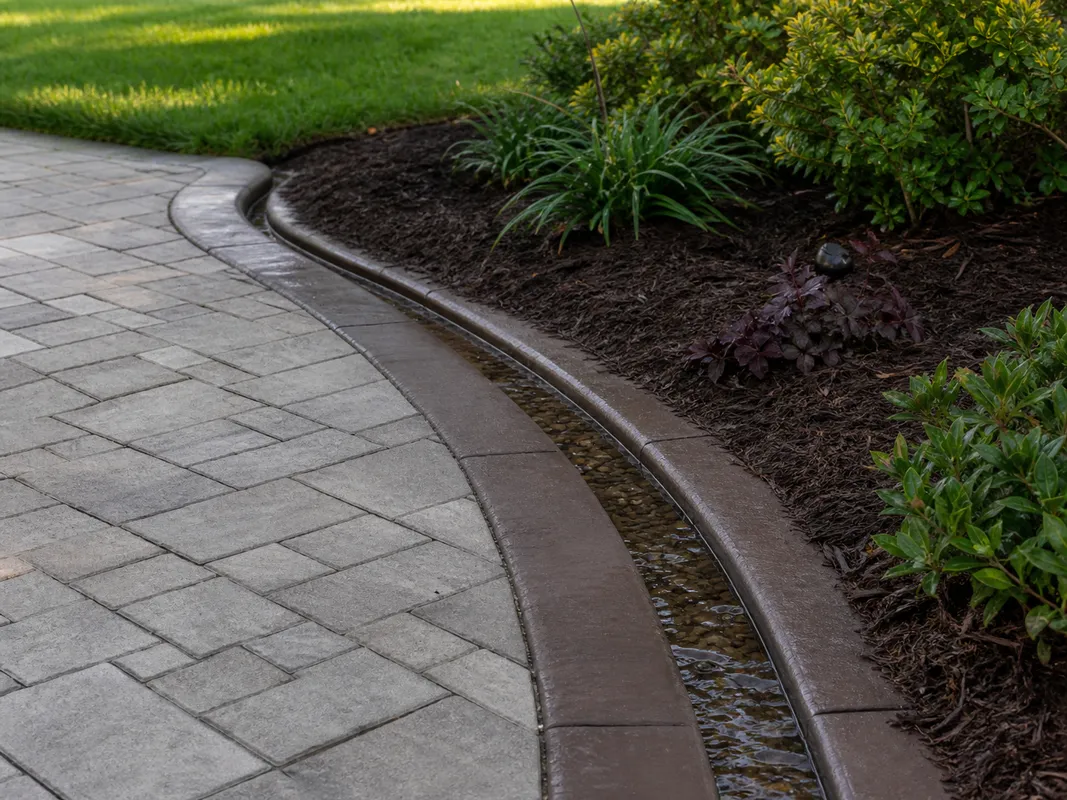 Maintained hardscape surface and landscape border in Washington IN.